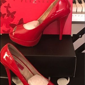 Red 5 inch platform Pleaser Pump.